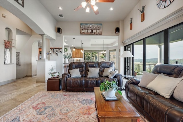 17400 Northlake Hills Dr, Jonestown, TX 78645 - living room with ceiling fan, baseboards, recessed lighting, decorative columns, and arched walkways