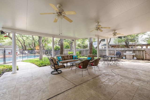 3808 Royal Troon Dr, Round Rock, TX 78664 - fenced backyard featuring a patio area, an outdoor living space, outdoor dining area, and a ceiling fan
