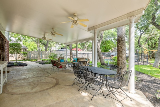 3808 Royal Troon Dr, Round Rock, TX 78664 - fenced backyard featuring a ceiling fan, a patio area, outdoor dining space, and an outdoor hangout area