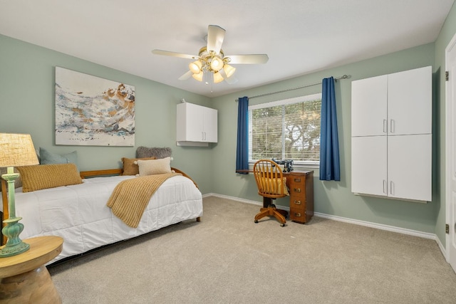 3808 Royal Troon Dr, Round Rock, TX 78664 - carpeted bedroom with baseboards and a ceiling fan