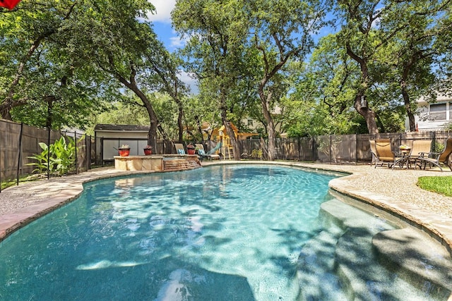 3808 Royal Troon Dr, Round Rock, TX 78664 - view of swimming pool featuring a fenced backyard, an outdoor structure, and a patio