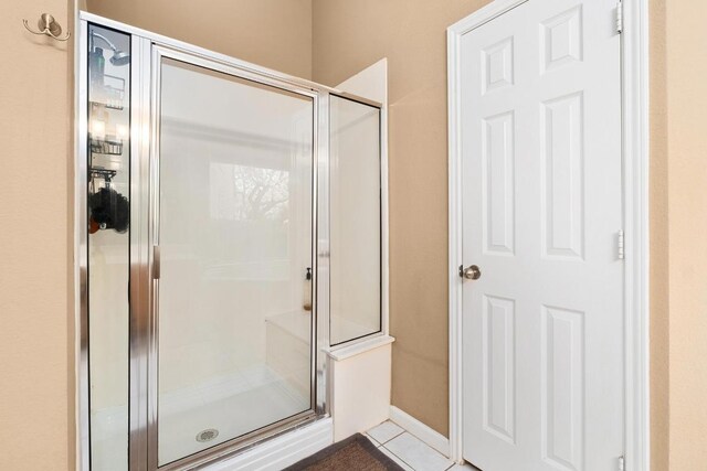 10609 Thoroughbred Dr, Austin, TX 78748 - bathroom featuring a shower stall and tile patterned flooring