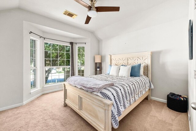 10609 Thoroughbred Dr, Austin, TX 78748 - bedroom featuring light carpet, lofted ceiling, baseboards, and ceiling fan