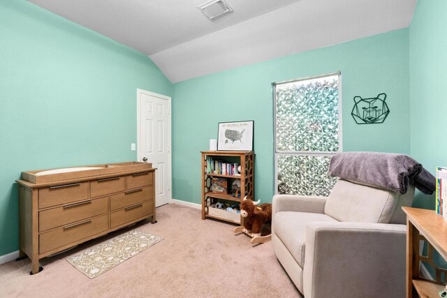 10609 Thoroughbred Dr, Austin, TX 78748 - living area with vaulted ceiling, light colored carpet, and baseboards