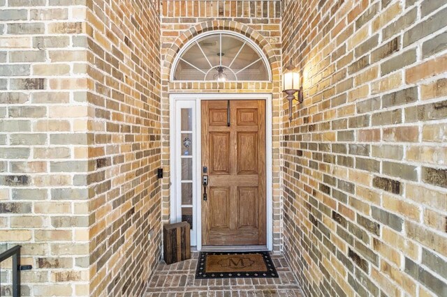 10609 Thoroughbred Dr, Austin, TX 78748 - view of exterior entry featuring brick siding