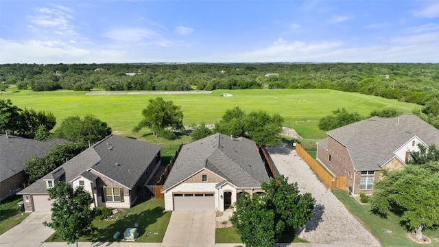 1049 Naranjo Dr, Georgetown, TX 78628 - view of subject property featuring a forest