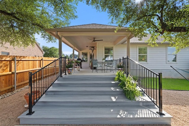 1049 Naranjo Dr, Georgetown, TX 78628 - wooden porch with a ceiling fan