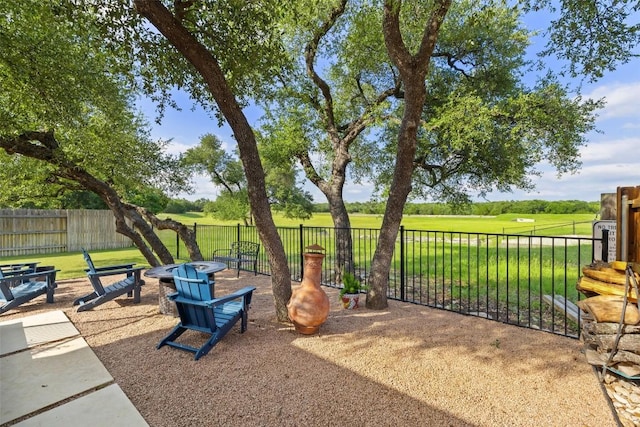 1049 Naranjo Dr, Georgetown, TX 78628 - view of patio with golf course view and an outdoor fire pit