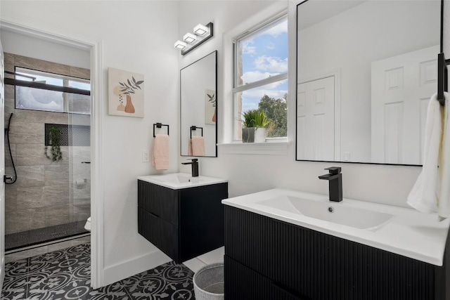 14904 Cordero Dr, Austin, TX 78717 - full bath with a shower stall, two vanities, and toilet