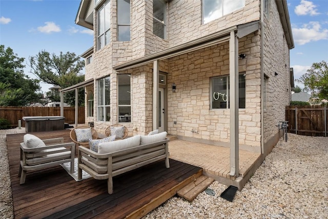 14904 Cordero Dr, Austin, TX 78717 - deck with a hot tub, a fenced backyard, and outdoor lounge area