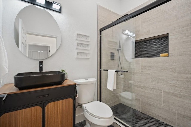 14904 Cordero Dr, Austin, TX 78717 - bathroom with vanity, a stall shower, and toilet