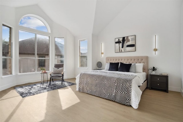 14904 Cordero Dr, Austin, TX 78717 - bedroom with vaulted ceiling, wood finished floors, and baseboards