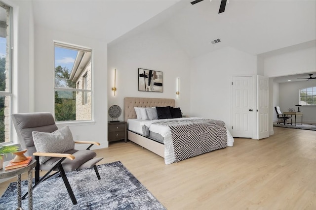 14904 Cordero Dr, Austin, TX 78717 - bedroom featuring light wood-type flooring, ceiling fan, baseboards, and high vaulted ceiling