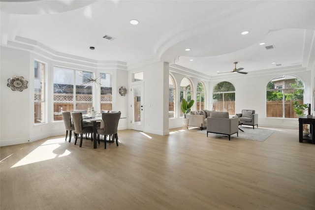 14904 Cordero Dr, Austin, TX 78717 - dining space featuring ceiling fan, baseboards, light wood-style floors, recessed lighting, and ornamental molding