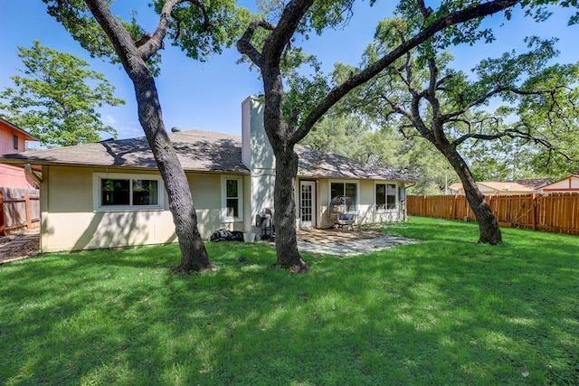 1600 Hatch Rd, Cedar Park, TX 78613 - back of property with a patio area, a chimney, and stucco siding