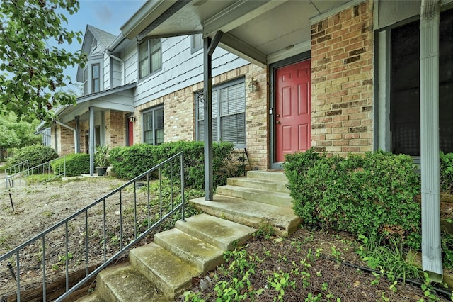 1411 Gracy Farms Ln Unit 69, Austin, TX 78758 - entrance to property featuring brick siding and a porch