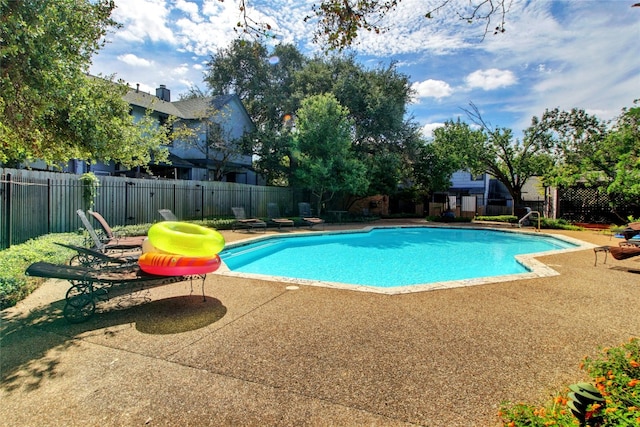 1411 Gracy Farms Ln Unit 69, Austin, TX 78758 - view of swimming pool with a patio area and a fenced backyard