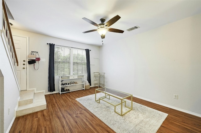 1411 Gracy Farms Ln Unit 69, Austin, TX 78758 - sitting room with ceiling fan, dark wood-style flooring, and baseboards