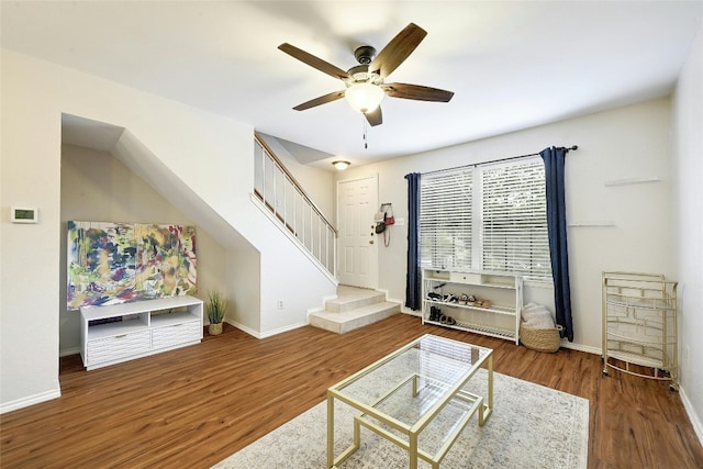 1411 Gracy Farms Ln Unit 69, Austin, TX 78758 - living room featuring ceiling fan, wood finished floors, stairs, and baseboards