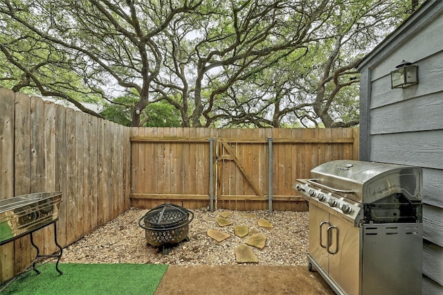 1411 Gracy Farms Ln Unit 69, Austin, TX 78758 - view of patio / terrace with area for grilling and a fire pit