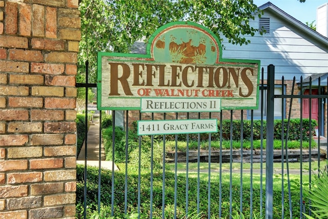 1411 Gracy Farms Ln Unit 69, Austin, TX 78758 - view of community / neighborhood sign