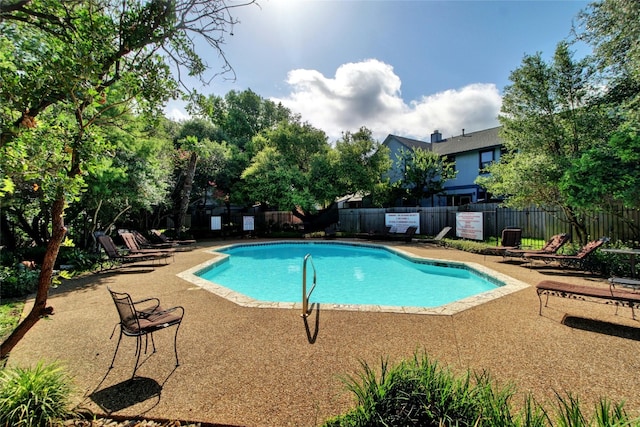 1411 Gracy Farms Ln Unit 69, Austin, TX 78758 - community pool with a patio area