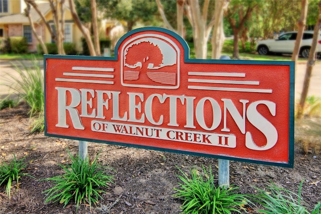 1411 Gracy Farms Ln Unit 69, Austin, TX 78758 - view of community / neighborhood sign