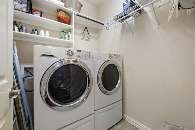 116 Belford St, Georgetown, TX 78628 - laundry room featuring separate washer and dryer, baseboards, and light tile patterned floors