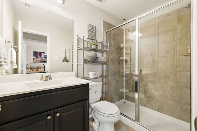 116 Belford St, Georgetown, TX 78628 - full bath with toilet, a stall shower, vanity, and tile patterned flooring
