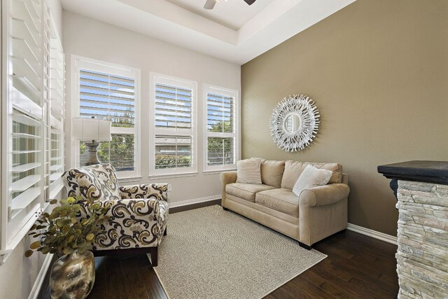 116 Belford St, Georgetown, TX 78628 - living room with healthy amount of natural light, baseboards, hardwood / wood-style floors, and ceiling fan