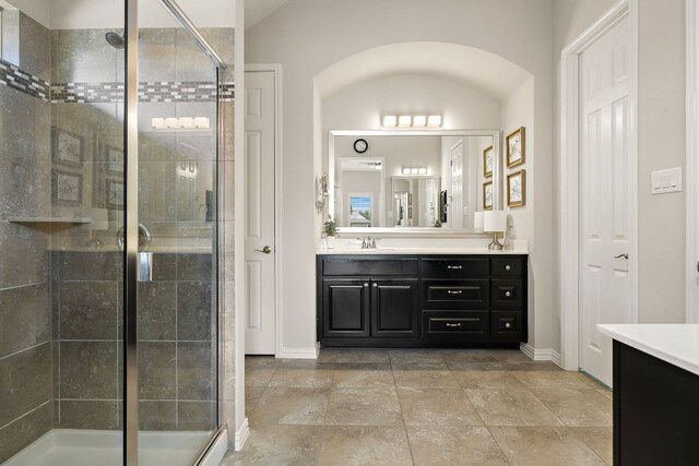 116 Belford St, Georgetown, TX 78628 - bathroom featuring baseboards, vanity, and a shower stall