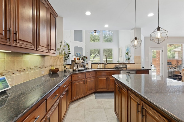 370 Ledge Stone Dr, Austin, TX 78737 - kitchen with a ceiling fan, tasteful backsplash, a sink, recessed lighting, and light tile patterned floors