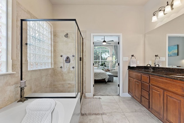 370 Ledge Stone Dr, Austin, TX 78737 - ensuite bathroom with a shower stall, double vanity, a bath, and ceiling fan