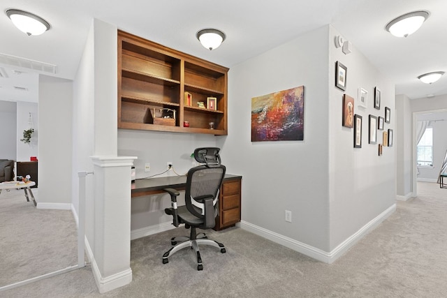 370 Ledge Stone Dr, Austin, TX 78737 - office area featuring carpet flooring, built in study area, and baseboards