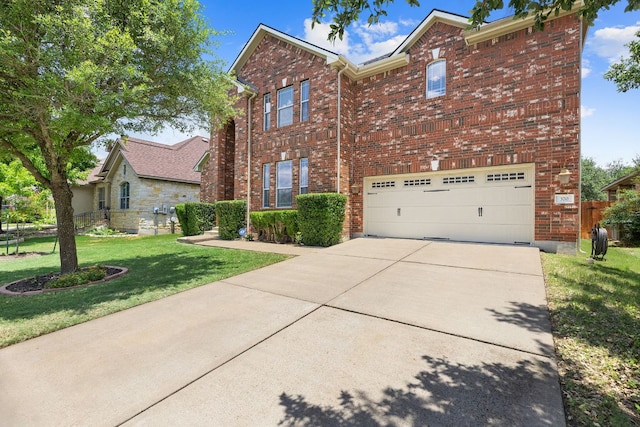 370 Ledge Stone Dr, Austin, TX 78737 - traditional-style home featuring driveway, a front yard, brick siding, and a garage