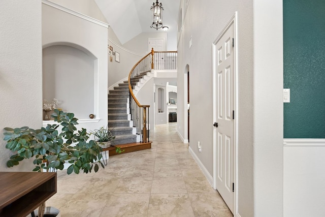 370 Ledge Stone Dr, Austin, TX 78737 - entryway featuring stairway and high vaulted ceiling