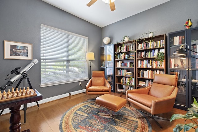 370 Ledge Stone Dr, Austin, TX 78737 - living area with a ceiling fan, wood finished floors, and baseboards