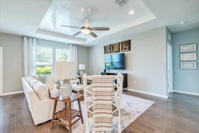 610 Ridge Park Dr, New Braunfels, TX 78130 - living area with a raised ceiling, wood finished floors, baseboards, and recessed lighting