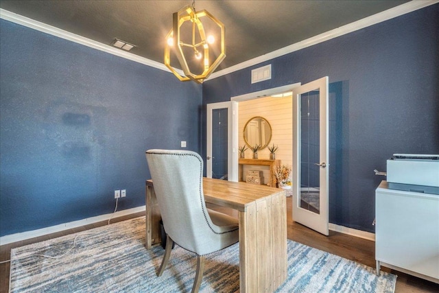 610 Ridge Park Dr, New Braunfels, TX 78130 - dining room with ornamental molding, a chandelier, french doors, wood finished floors, and baseboards