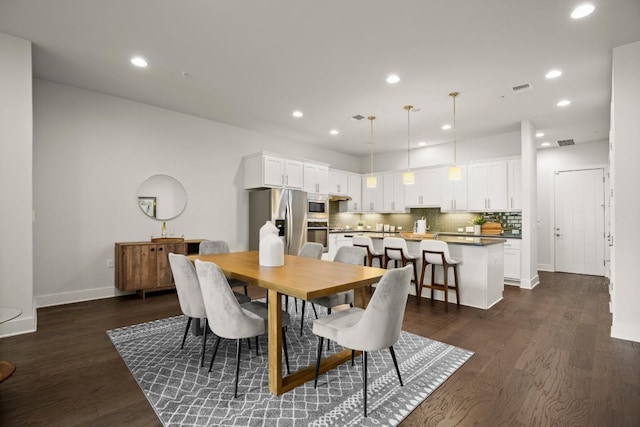 2116 Philomena St, Austin, TX 78723 - dining room with recessed lighting and dark wood-type flooring