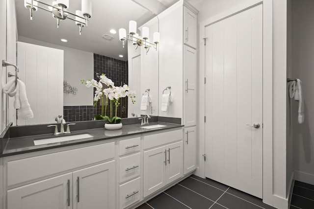 2116 Philomena St, Austin, TX 78723 - full bath featuring double vanity, recessed lighting, and tile patterned flooring