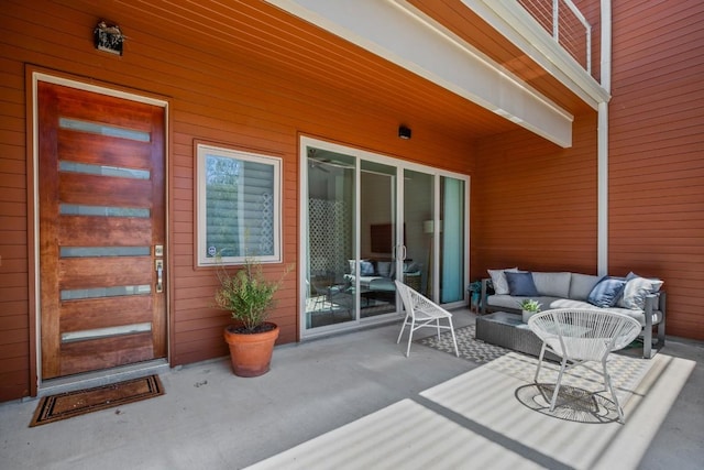 2116 Philomena St, Austin, TX 78723 - wooden deck featuring an outdoor living space and a patio area