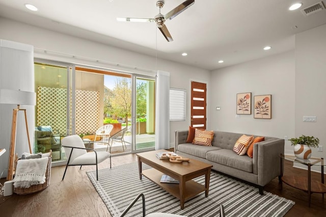 2116 Philomena St, Austin, TX 78723 - living area with ceiling fan, wood finished floors, and recessed lighting