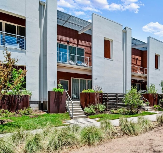 2116 Philomena St, Austin, TX 78723 - view of front of home featuring a balcony