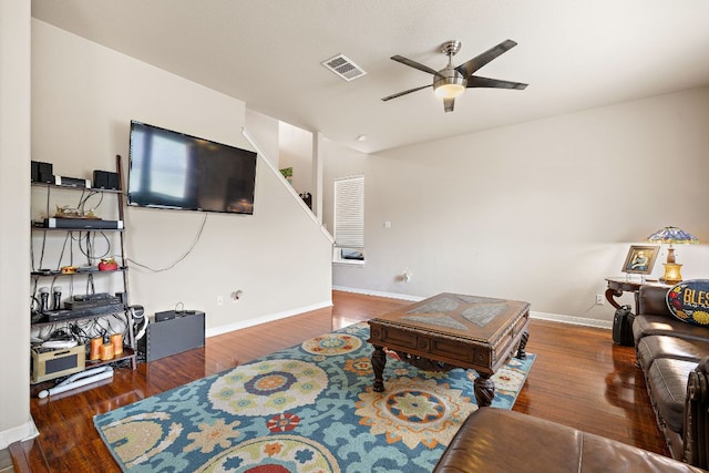 326 Comal Run, Hutto, TX 78634 - living room featuring a ceiling fan, wood finished floors, and stairway