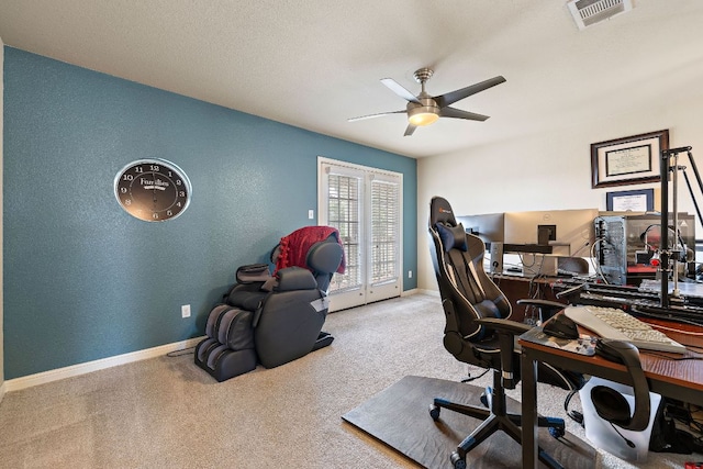 326 Comal Run, Hutto, TX 78634 - office with a ceiling fan, carpet flooring, and a textured wall