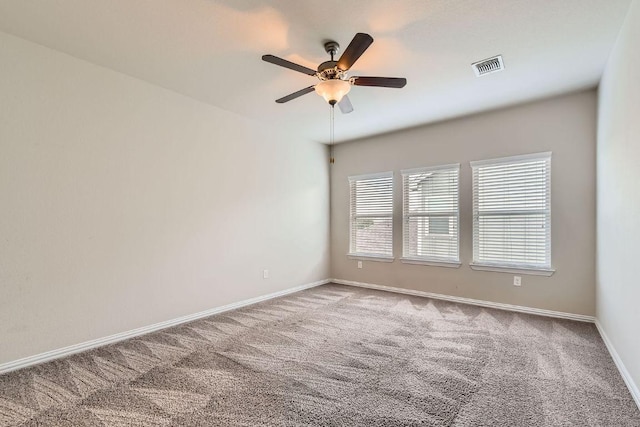 8817 Slater Dr, Austin, TX 78747 - carpeted empty room featuring ceiling fan and baseboards