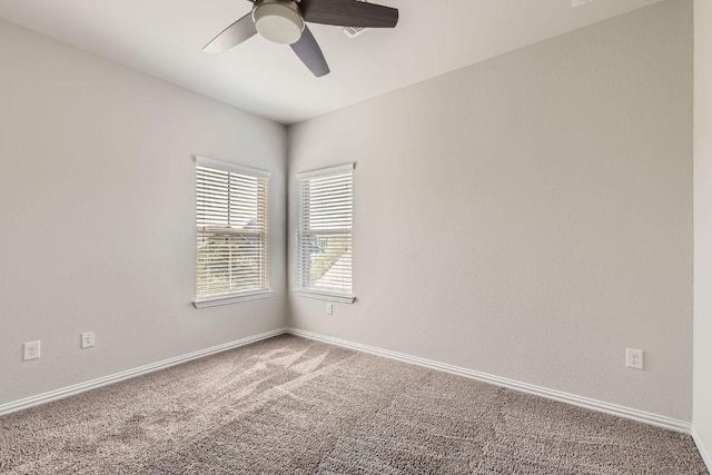 8817 Slater Dr, Austin, TX 78747 - carpeted spare room with ceiling fan and baseboards
