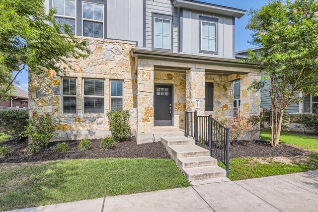 8817 Slater Dr, Austin, TX 78747 - view of front facade with stone siding
