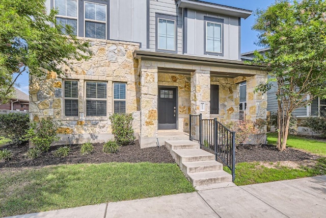 8817 Slater Dr, Austin, TX 78747 - view of front of property featuring stone siding